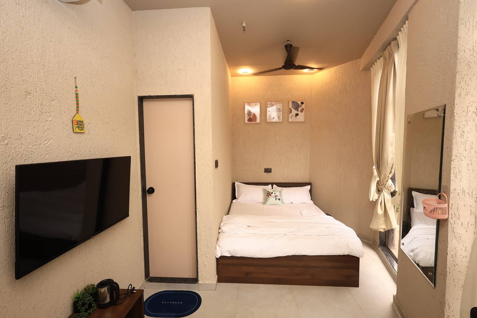 Kizuna studio with playful art and warm window light